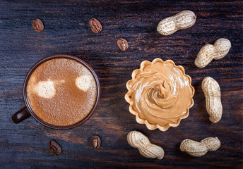 Espresso coffee in a ceramic bowl, basket waffle with peanut but