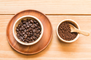 Coffee beans and instant coffee in the wood bowl 3
