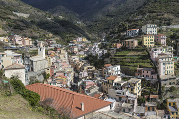 Fototapeta na wymiar Riomaggiore village in Italy. Riomaggiore is one of five famous