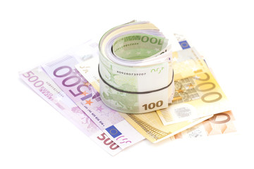 Euro banknotes under rubber band on banknotes