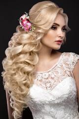 beautiful blond girl  in image of the bride with purple flowers on her head. Beauty face. 