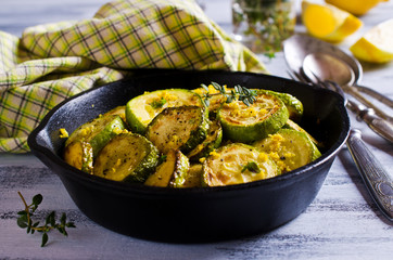 Fried zucchini with lemon zest