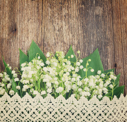 Lilly of valley on wood 