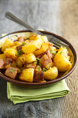 Fried potatoes with pork and onion