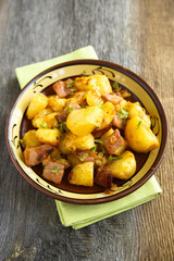 Fried potatoes with pork and onion