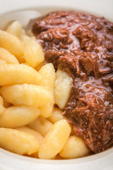 Dumplings with pork sauce.