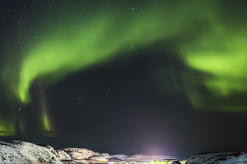Fototapeta na wymiar Aurora, Barents Sea coast, Russia