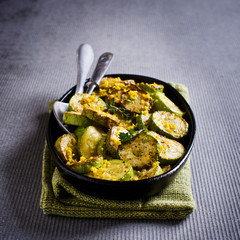 Fried zucchini with lemon zest
