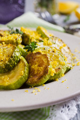 Fried zucchini with lemon zest