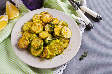 Fried zucchini with lemon zest