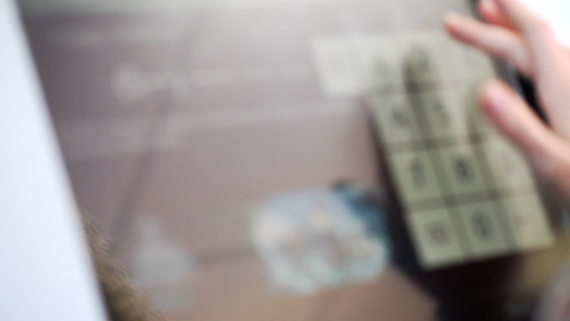 terminal, finance, touch, ATM   /   she uses a touch-screen terminal closeup