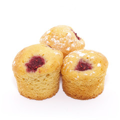 Three muffins isolated on white