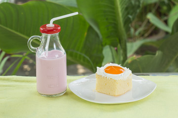 Orange cake and strawberry milk