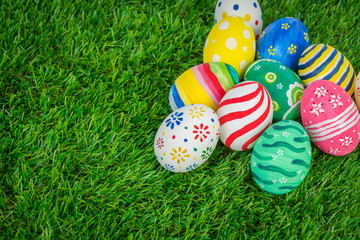 Fototapeta premium Easter Eggs on Fresh Green Grass