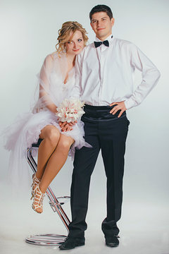 couple of bride and groom covered with veil