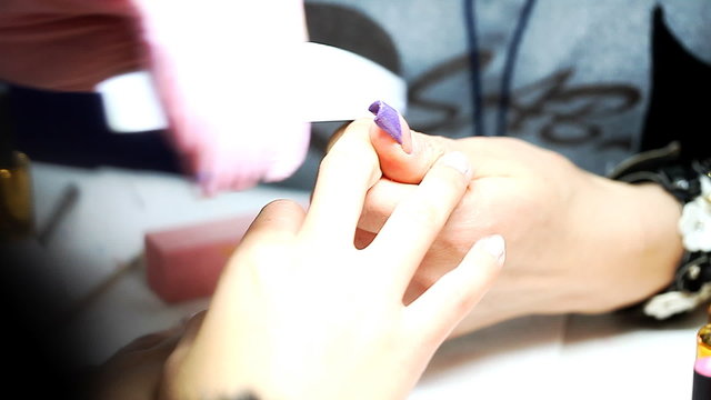 manicure process, nails, close-up,    /    manicurist makes the new gel polish manicure, close-up, beauty and body care