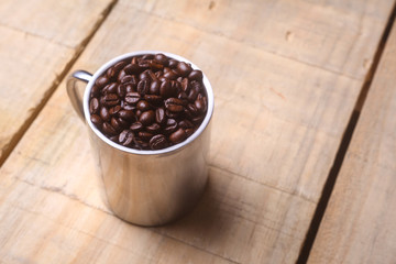 Coffee beans in a mug