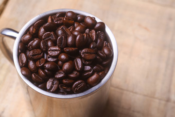 Coffee beans in a mug