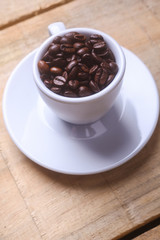 Coffee beans in a cup
