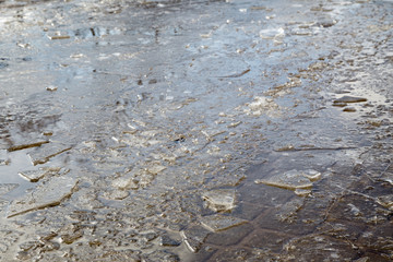 Puddles and chopped ice