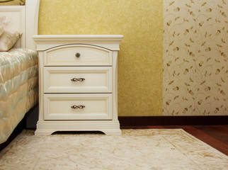 Interior with white bed and table