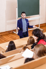 Teacher explaining something to students