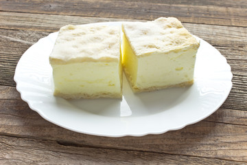 Cream pie with layers of puff pastry in plate