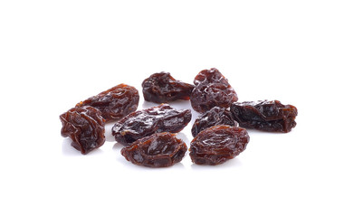 yellow raisins  on white background