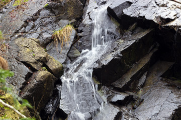 Waterfalls from mountain rivers ; Beautiful waterfall from mountain rivers overflowed cast down the rocky scenery