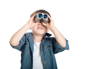 happy little boy child white background studio isolated with binoculars