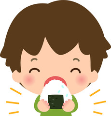 笑顔でおにぎりを頬張る男の子