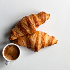 Сroissants, coffee espresso on white