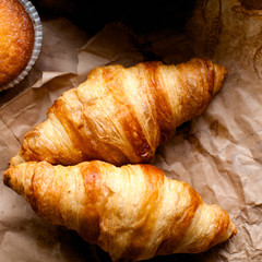 Сroissants, muffins on brown - 105526095