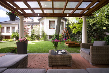 Gazebo with stylish garden furniture