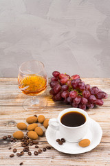 Cup coffee espresso, with chocolate, grape and  brandy
