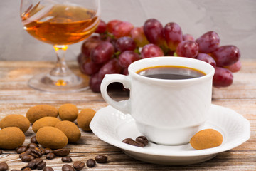 Cup coffee espresso, with chocolate, grape and  brandy