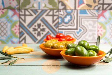 Tapas bowls with giant olives and cherry tomatoes