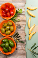 Tapas bowls with giant olives and cherry tomatoes