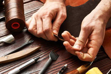 Man working with leather