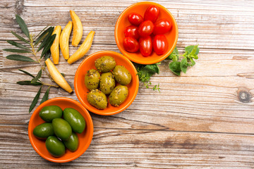 Tapas bowls with giant olives and cherry tomatoes