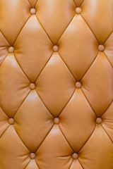 Leather buttoned armchair back