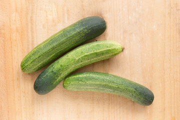 top view of Cucumber on wood background