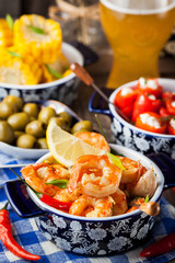 Selection of spanish tapas  and beer