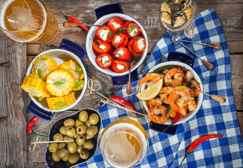 Selection of spanish tapas  and beer