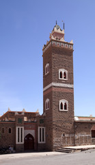 Obraz premium Modern minaret, with white windows in Morocco