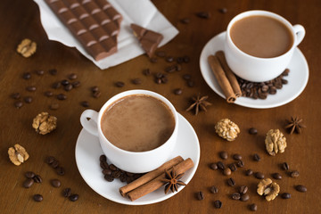 Coffee and chocolate on wood