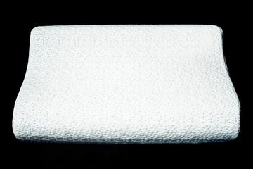 orthopedic pillow on a dark background