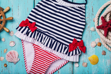 Fototapeta premium Children's swimsuit closeup, top view