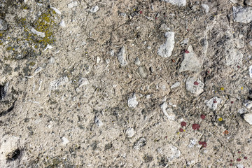 old concrete wall with yellow spots