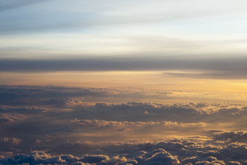 High above the clouds with beautiful sunset light - 105537474